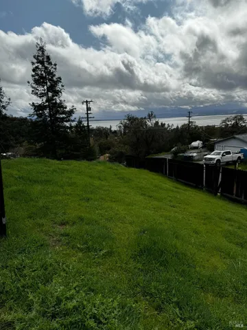 a view of a garden with houses