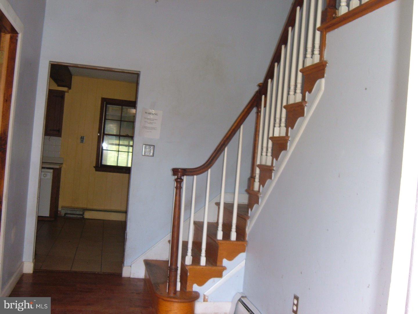 114 Scrapetown Road Pemberton, NJ 08068 - Photo 14 of 23 a view of staircase with wooden floor and a potted plant
