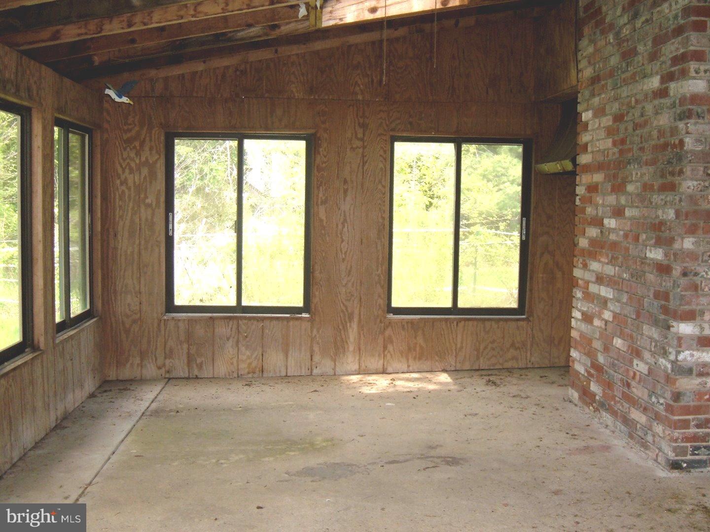 114 Scrapetown Road Pemberton, NJ 08068 - Photo 15 of 23 a view of an empty room with a window