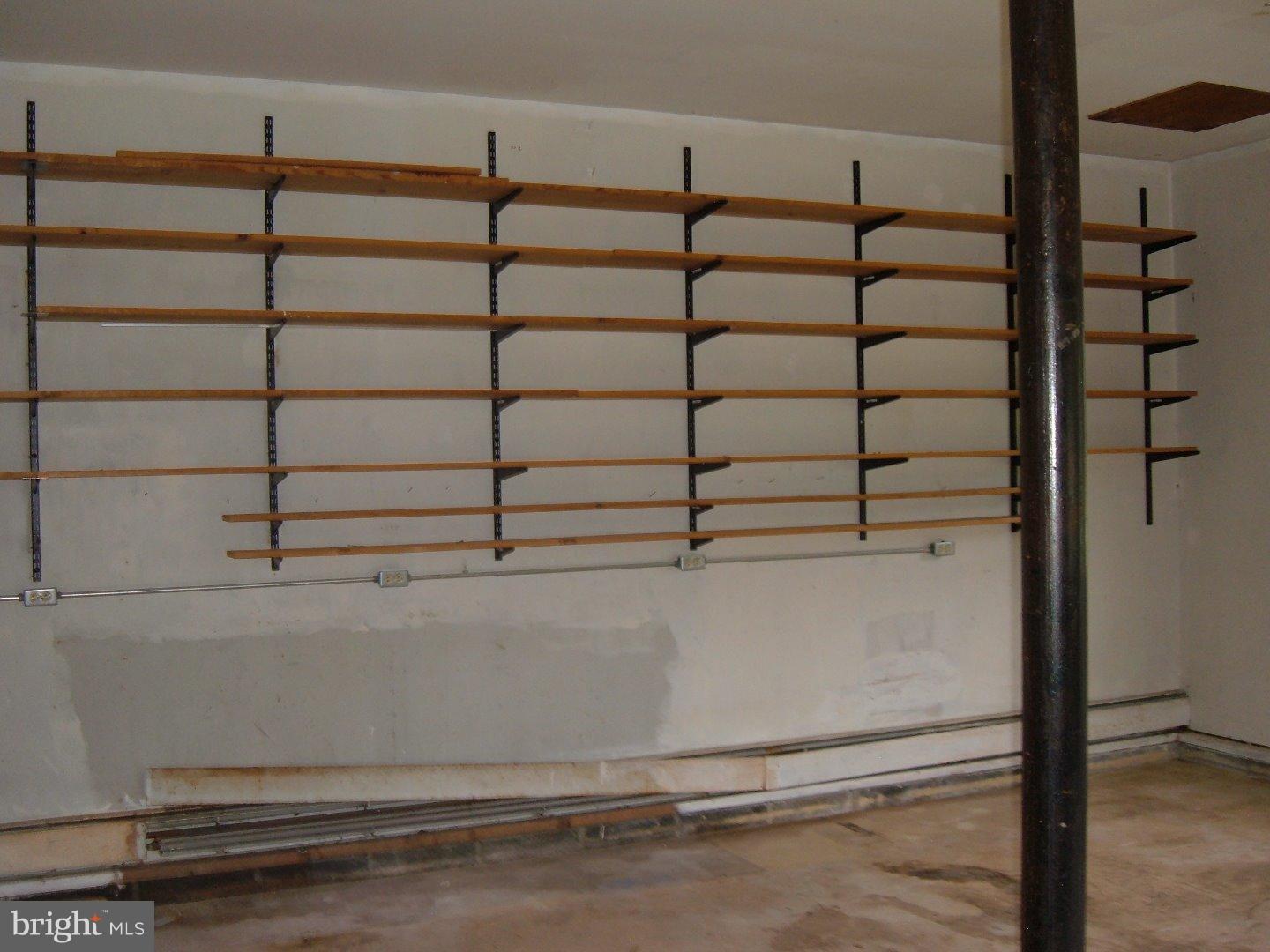 114 Scrapetown Road Pemberton, NJ 08068 - Photo 16 of 23 a view of a room with racks on the wall