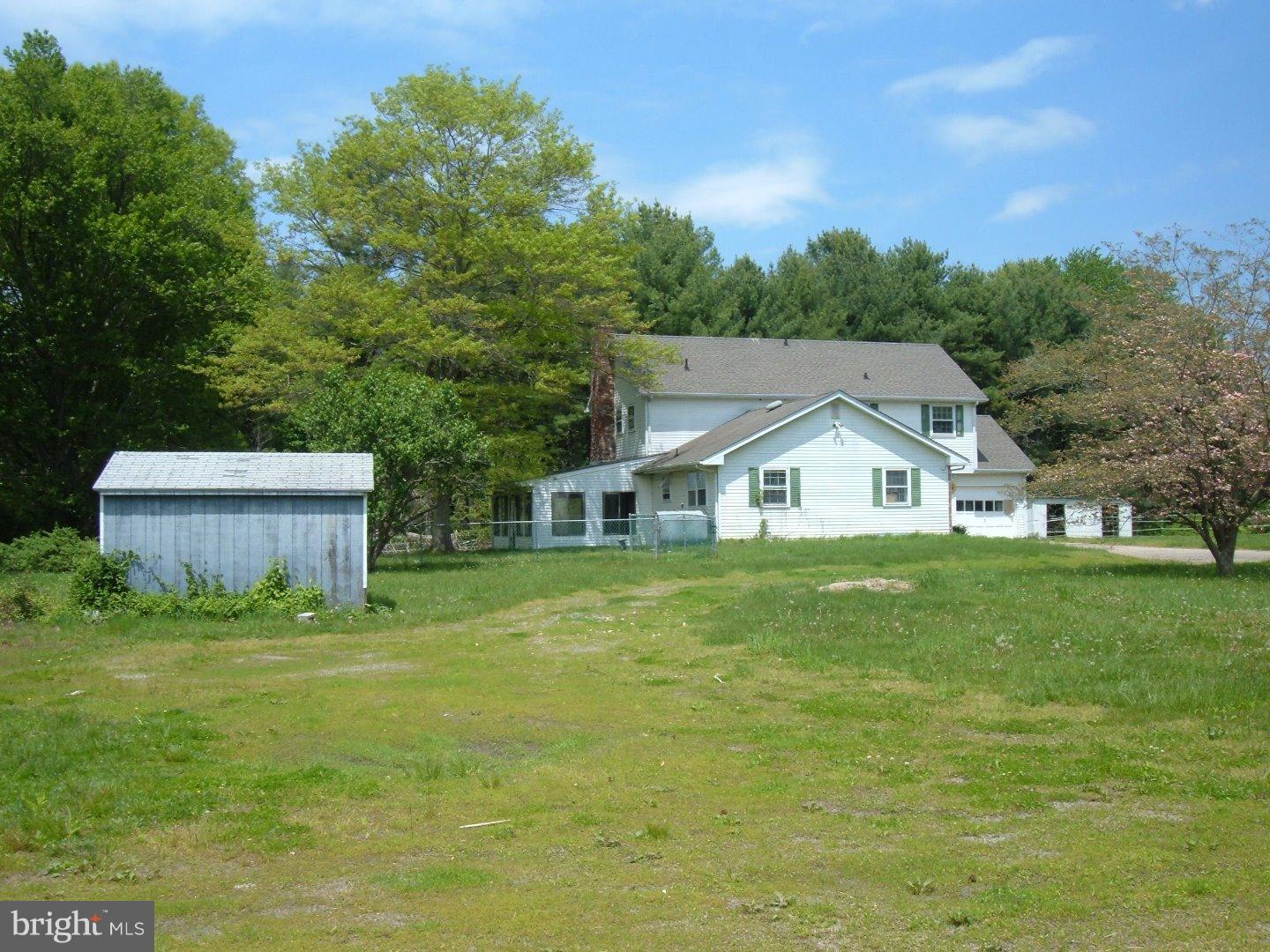 114 Scrapetown Road Pemberton, NJ 08068 - Photo 20 of 23 a front view of a house with a yard