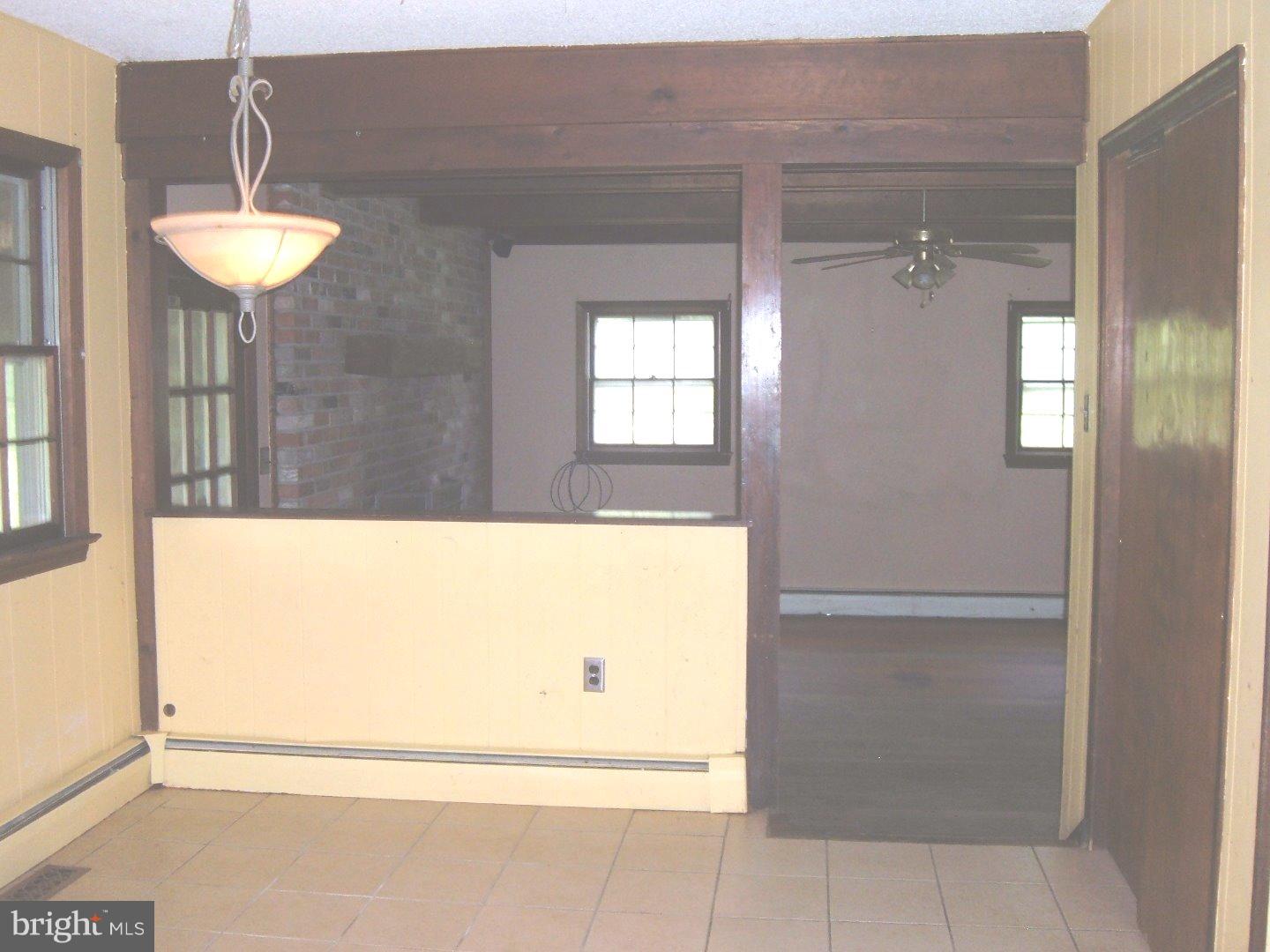 114 Scrapetown Road Pemberton, NJ 08068 - Photo 5 of 23 a view of a hallway with a chandelier