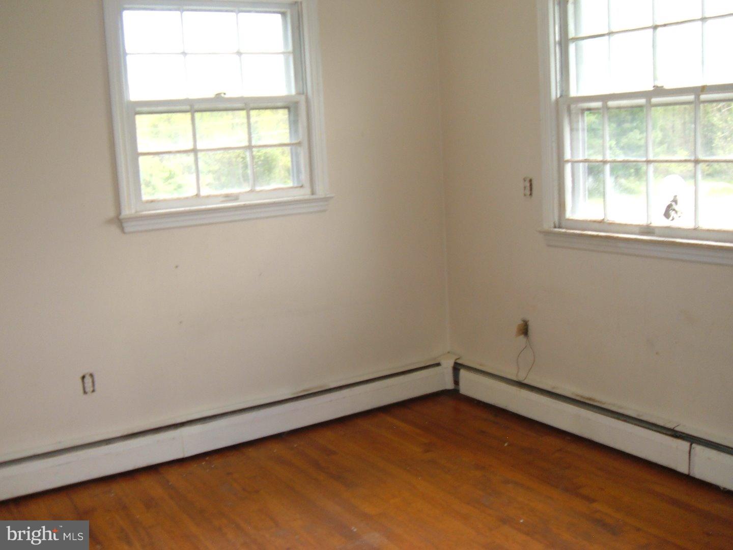 114 Scrapetown Road Pemberton, NJ 08068 - Photo 10 of 23 an empty room with a window