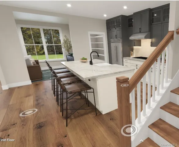 a view of a dining room with furniture and a table