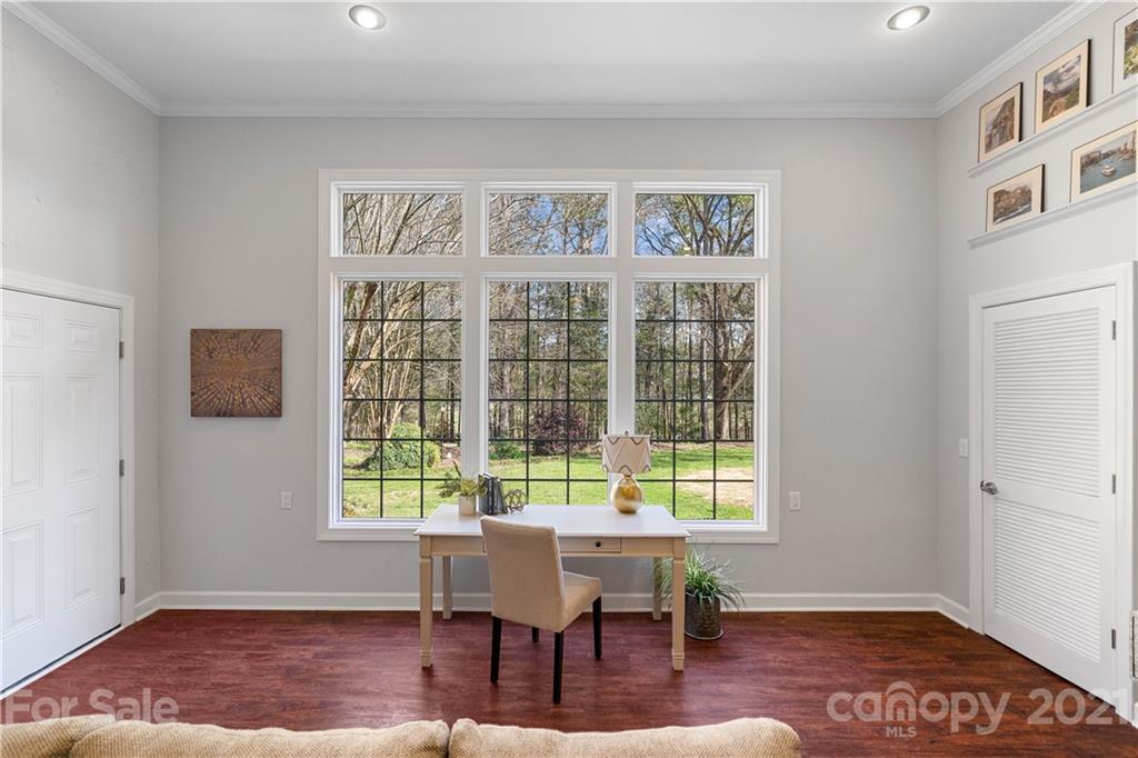 8866 Collins Road Indian Land, SC 29707 - Photo 14 of 48 a view of a workspace with furniture and a window