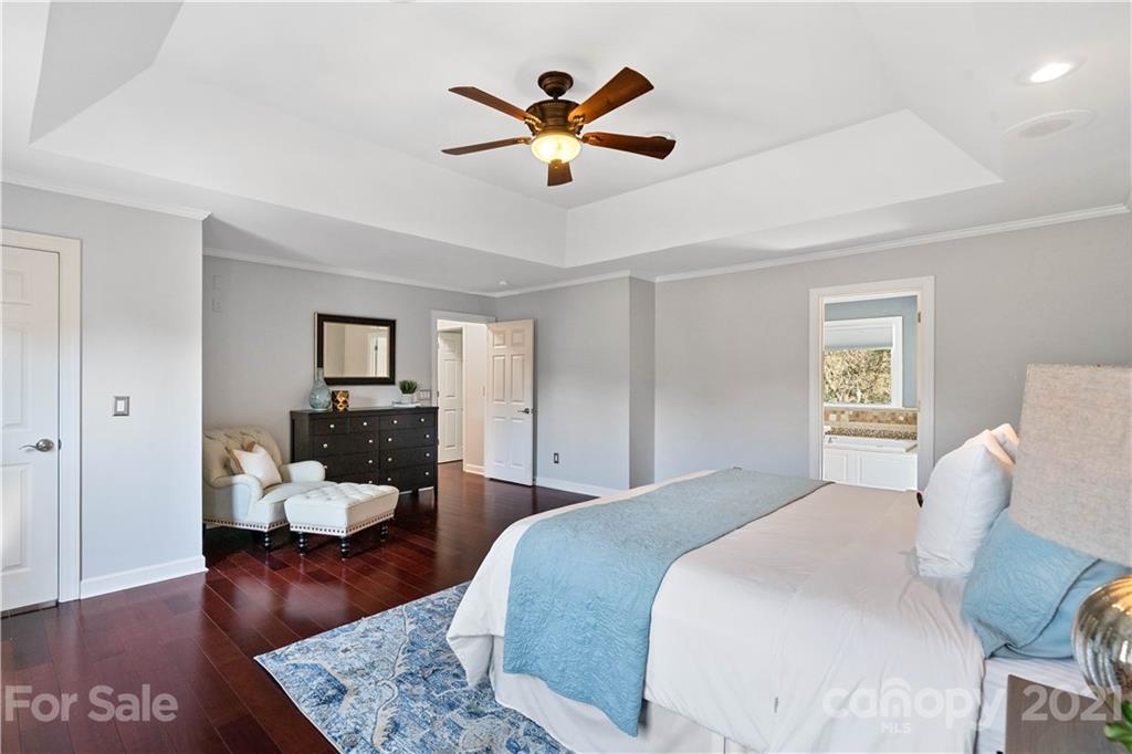 8866 Collins Road Indian Land, SC 29707 - Photo 20 of 48 a bedroom with a bed and wooden floor