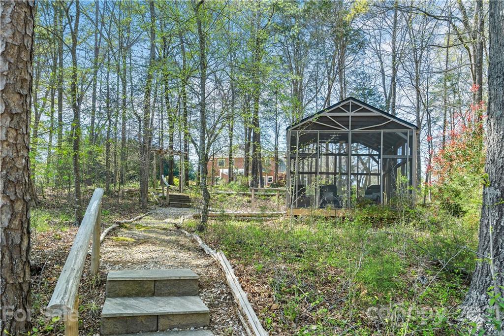 8866 Collins Road Indian Land, SC 29707 - Photo 43 of 48 a front view of a house with a yard