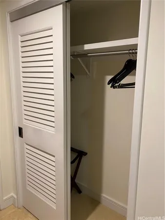 a view of a room with rack on the wall