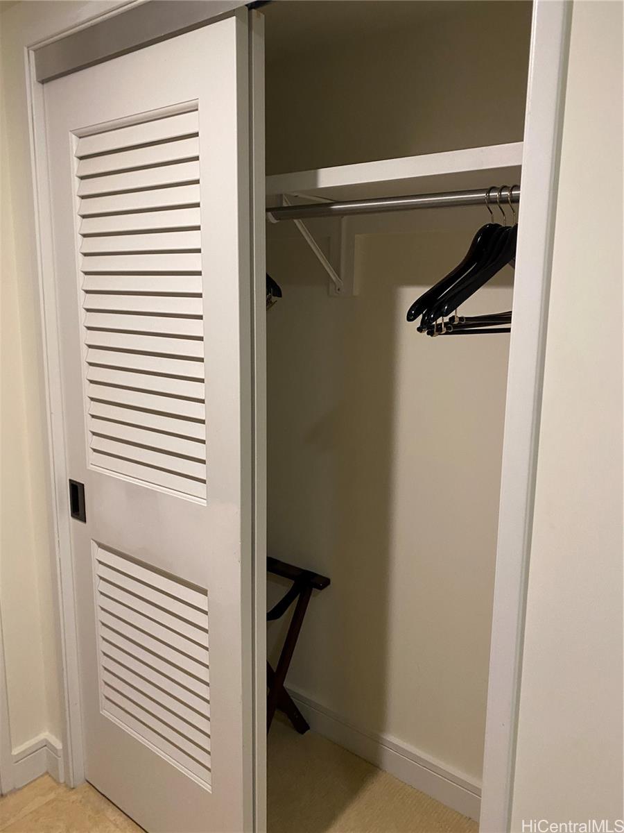 223 Saratoga Road, Unit 2220 Honolulu, HI 96815 - Photo 13 of 15 a view of a room with rack on the wall