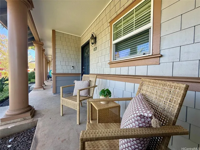 a view of a house with outdoor seating area