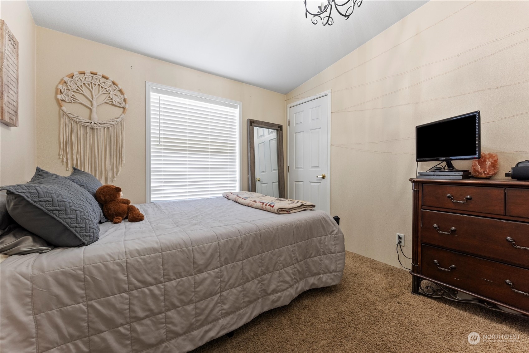 698 South Canal Road Othello, WA 99344 - Photo 30 of 40 a bedroom with a bed and a flat screen tv
