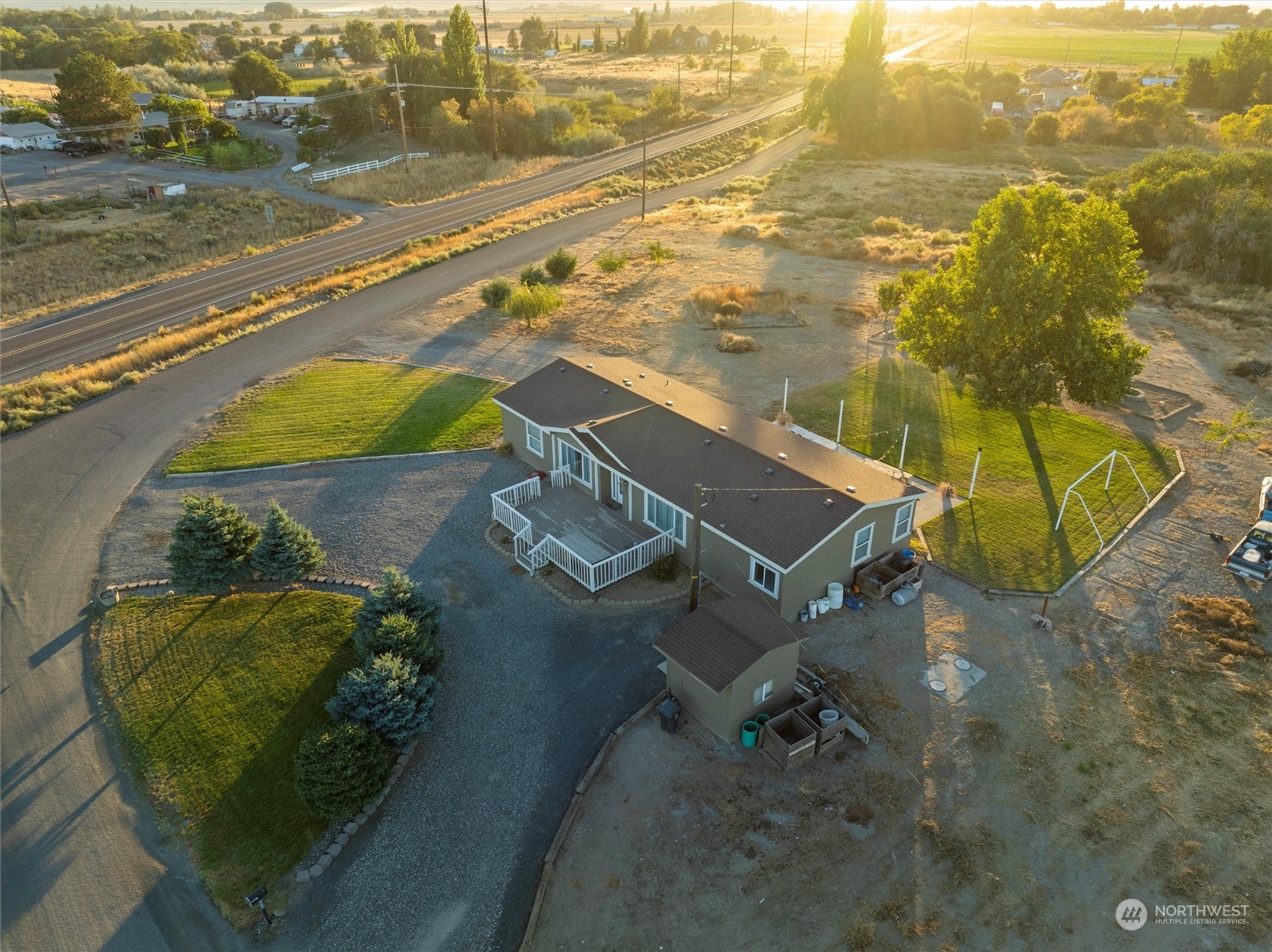 698 South Canal Road Othello, WA 99344 - Photo 3 of 40 an aerial view of residential houses with outdoor space