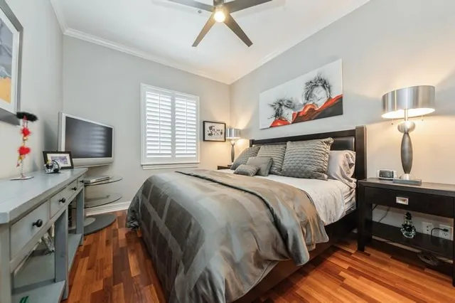 a bedroom with a bed and a couch