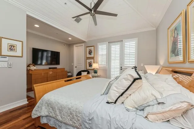 a spacious bathroom with a double vanity sink a mirror and a bathtub