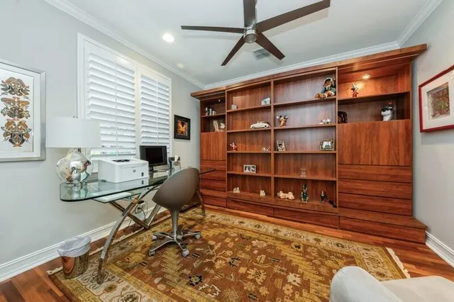 a view of a workspace with furniture