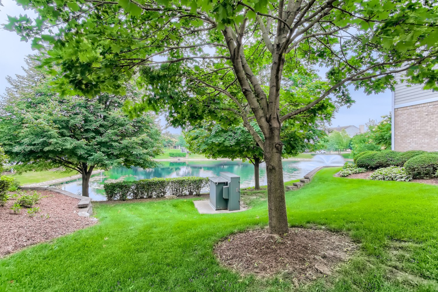 1315 Lake Street, Unit 204 Addison, IL 60101 - Photo 13 of 13 a front view of a house with garden