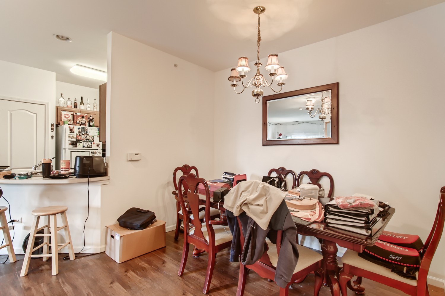1315 Lake Street, Unit 204 Addison, IL 60101 - Photo 5 of 13 a view of a dining room with furniture and wooden floor