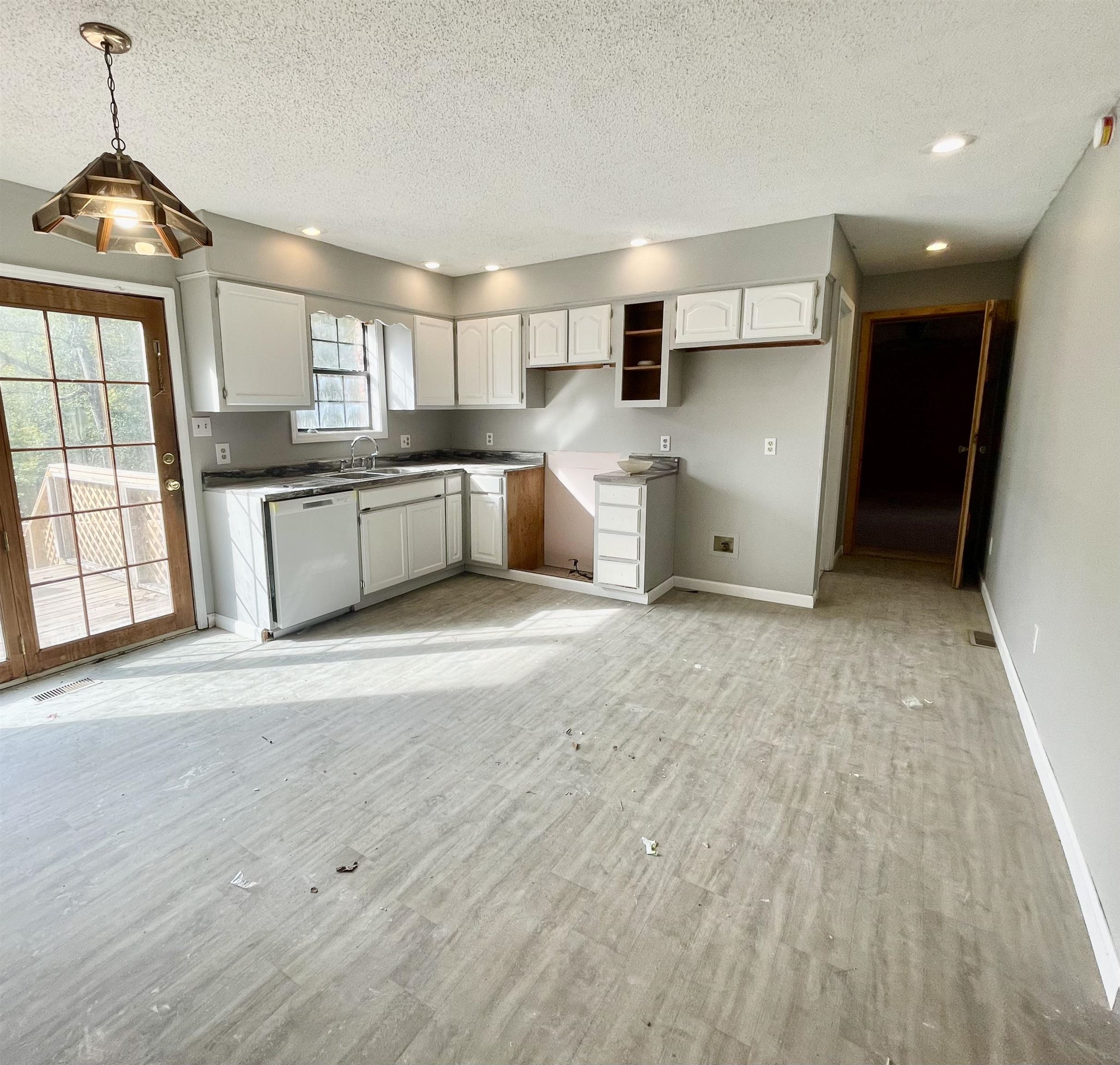 26 Cr 341 Road Iuka, MS 38852 - Photo 5 of 21 a large kitchen with lot of cabinets and wooden floor