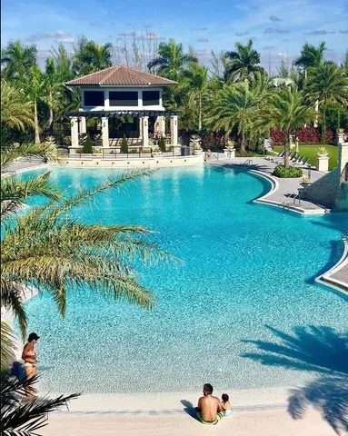 a front view of house with yard and outdoor seating