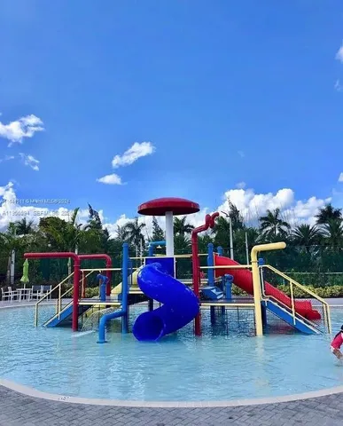 a view of a chairs and tables in the patio