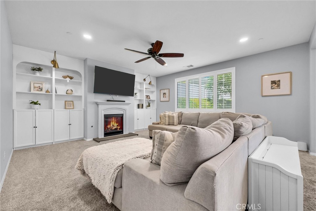 37656 Needlegrass Road Murrieta, CA 92563 - Photo 4 of 29 As you walk into the family room, you can see why your company will want to linger a while.