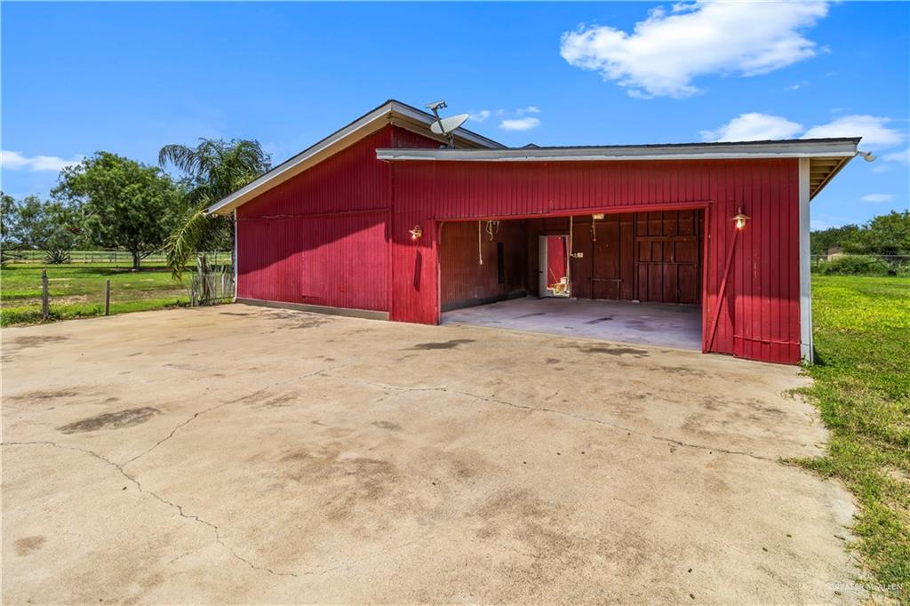 21440 Sunflower Road Edinburg, TX 78542 - Photo 2 of 25 a view of a house with a yard