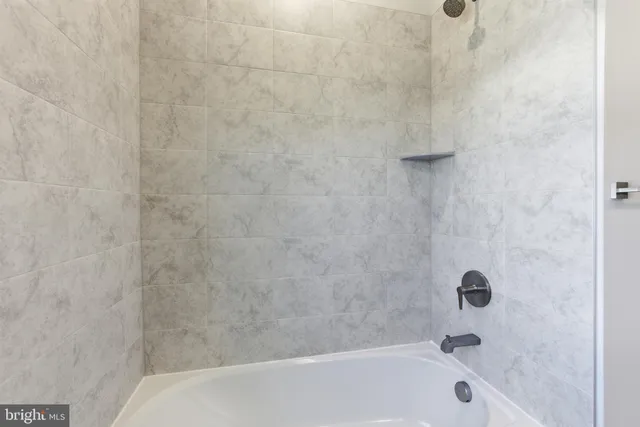 a bathroom with a bathtub