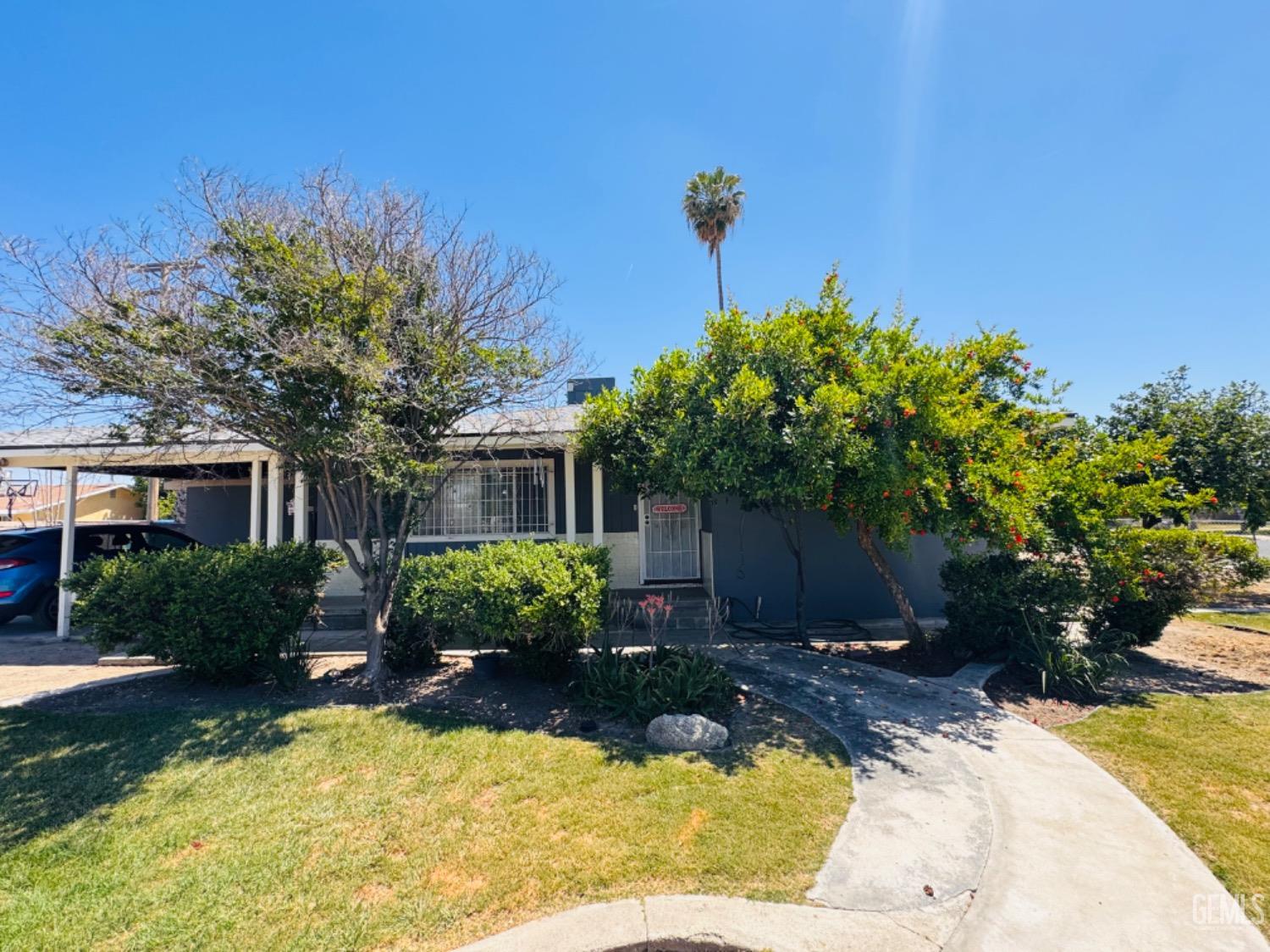 Undisclosed Address Delano, CA 93215 - Photo 1 of 18 a view of a swimming pool with a patio