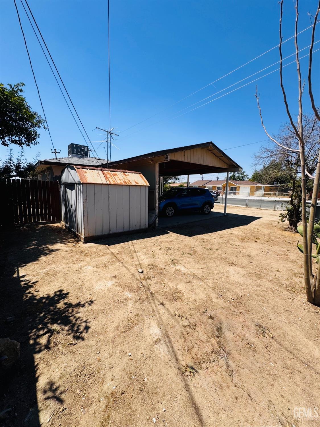 Undisclosed Address Delano, CA 93215 - Photo 13 of 18 a view of a house with a yard