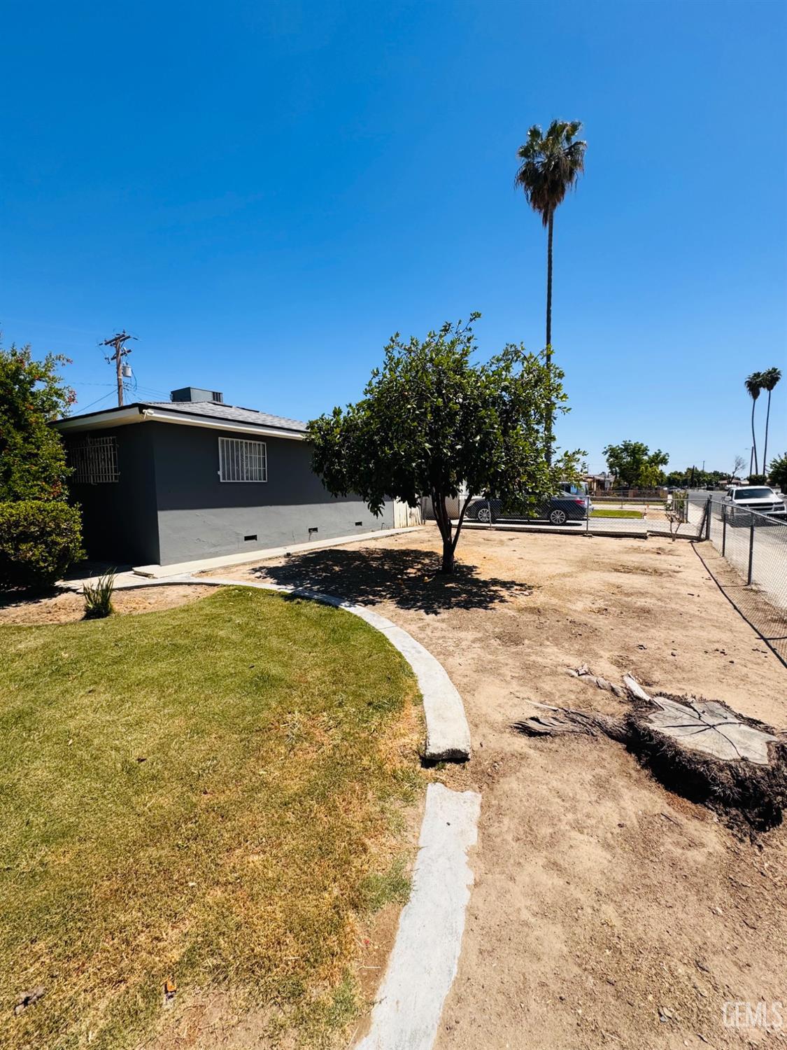 Undisclosed Address Delano, CA 93215 - Photo 16 of 18 a view of a swimming pool with a patio