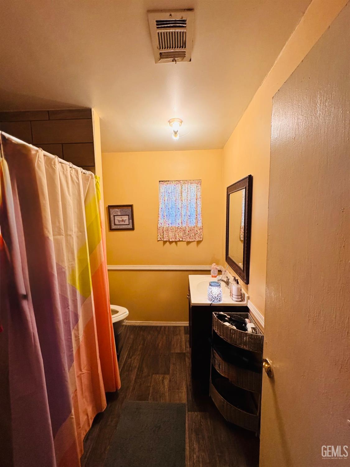 Undisclosed Address Delano, CA 93215 - Photo 10 of 18 a bathroom with a sink and a mirror