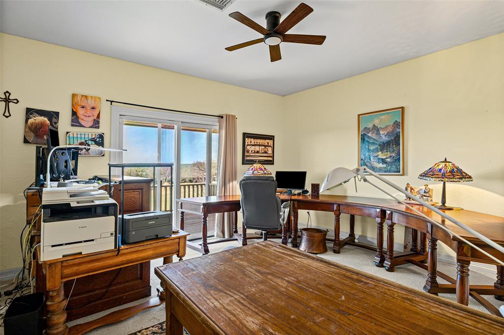 8908 Brierfield Road Granbury, TX 76049 - Photo 26 of 40 a room with furniture and a window