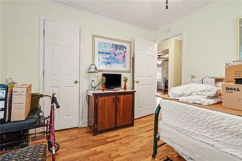 1497 Harris Road Jasper, GA 30143 - Photo 17 of 32 a living room with furniture and a flat screen tv