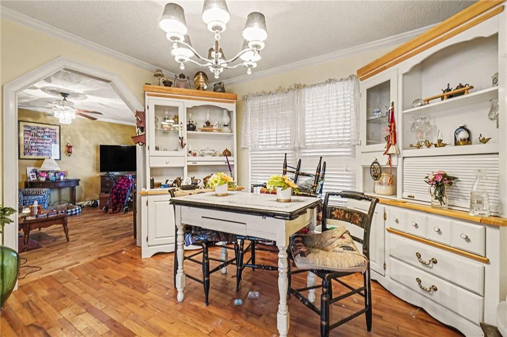 1497 Harris Road Jasper, GA 30143 - Photo 4 of 32 a view of a dining room with furniture