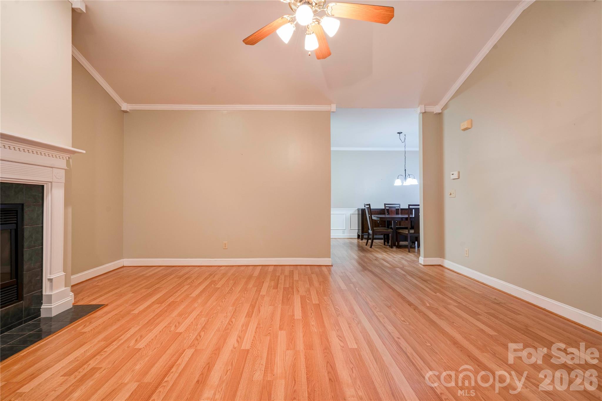 150 Columns Circle Shelby, NC 28150 - Photo 12 of 42 a view of empty room with wooden floor and fireplace