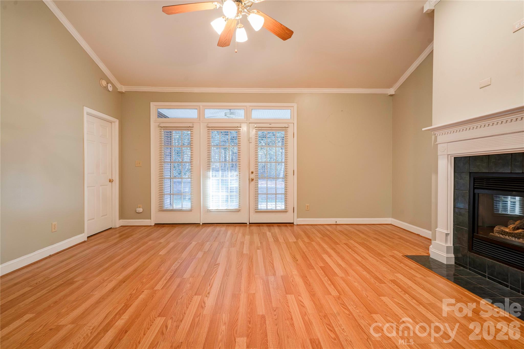 150 Columns Circle Shelby, NC 28150 - Photo 13 of 42 a view of an empty room with wooden floor and a window