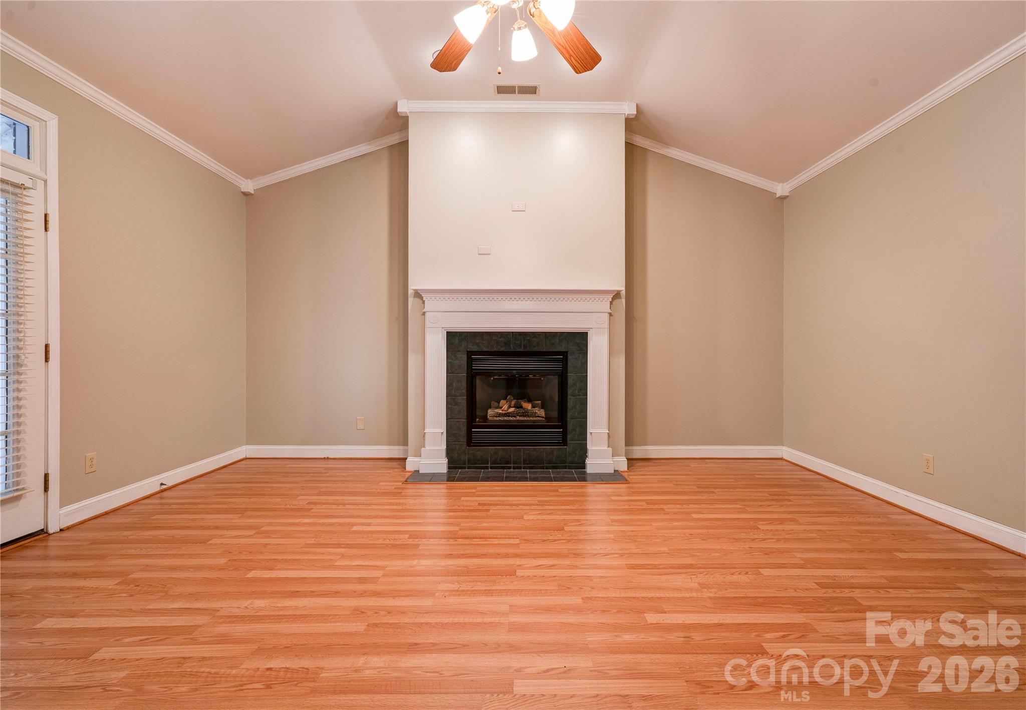 150 Columns Circle Shelby, NC 28150 - Photo 14 of 42 a view of an empty room with wooden floor and a fireplace