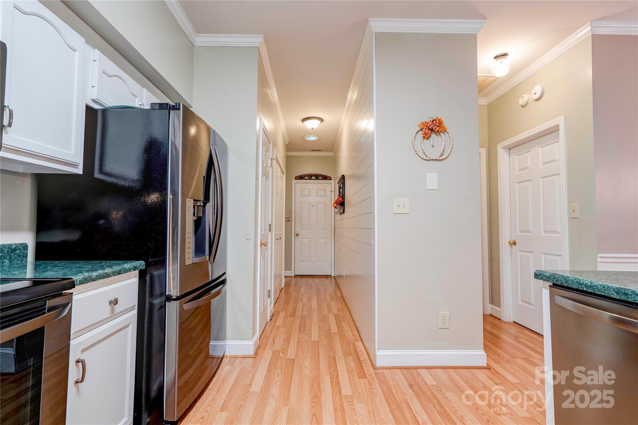 150 Columns Circle Shelby, NC 28150 - Photo 14 of 44 a view of a kitchen with refrigerator and wooden floor