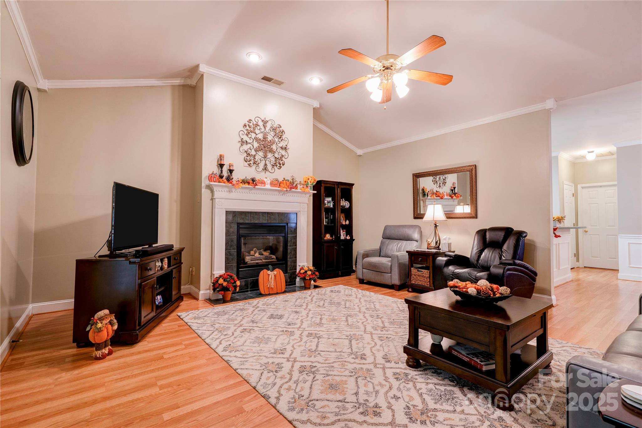 150 Columns Circle Shelby, NC 28150 - Photo 15 of 44 a living room with furniture a flat screen tv and a fireplace