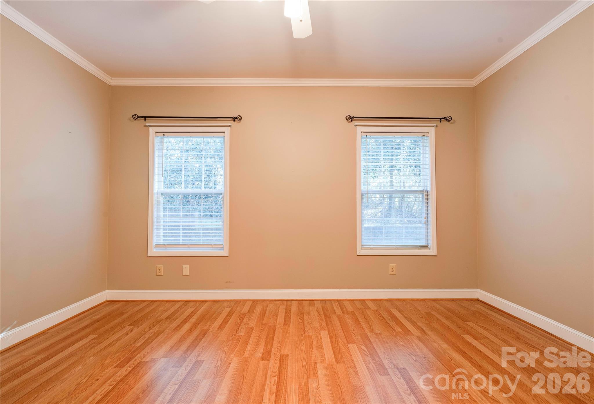 150 Columns Circle Shelby, NC 28150 - Photo 15 of 42 an empty room with wooden floor and windows