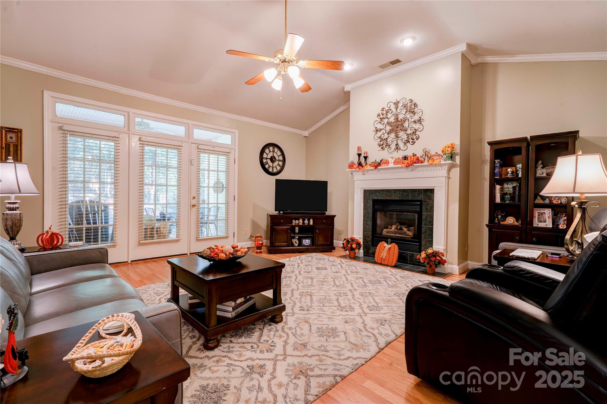 150 Columns Circle Shelby, NC 28150 - Photo 16 of 44 a living room with furniture a fireplace and a flat screen tv