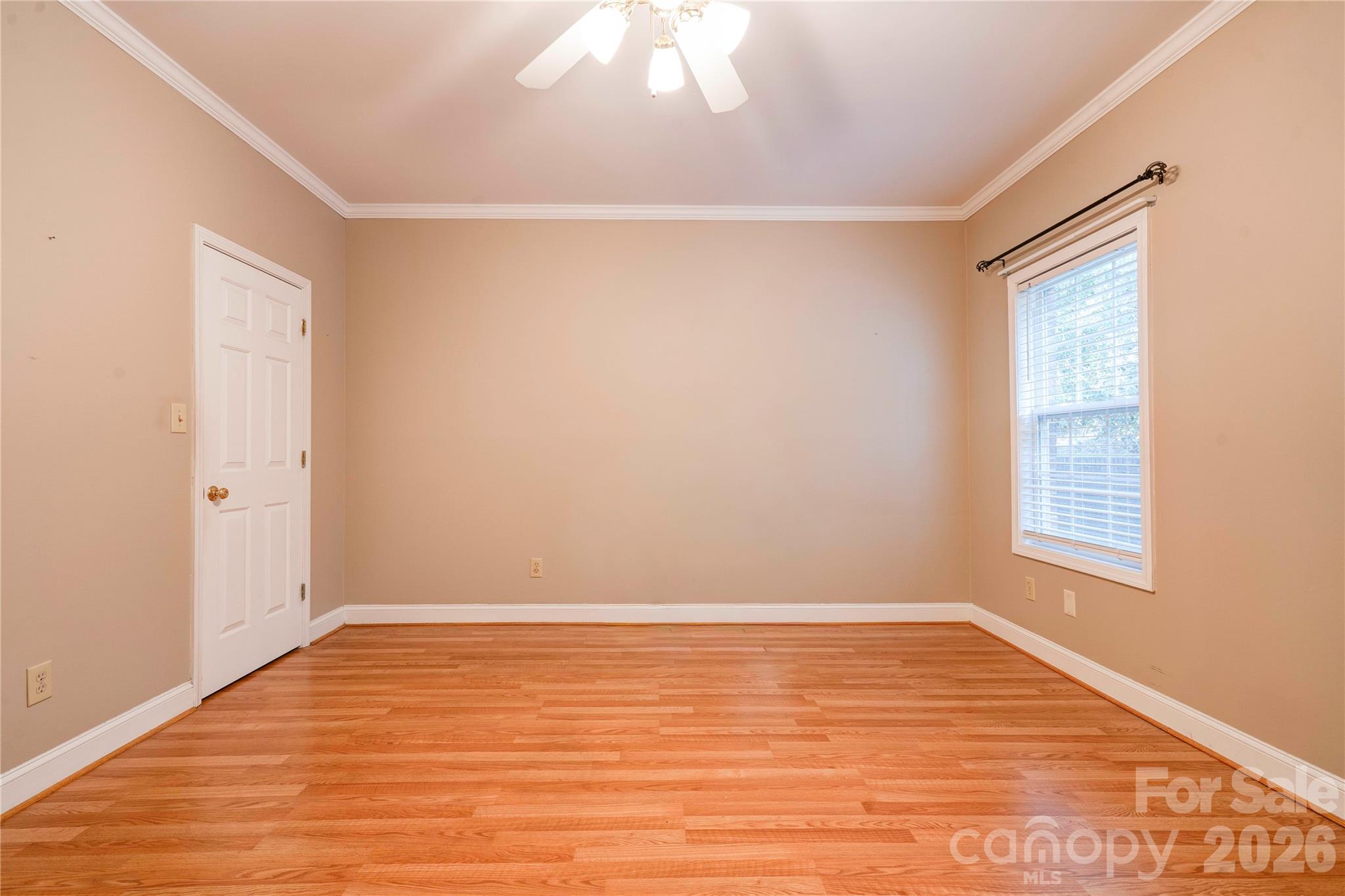 150 Columns Circle Shelby, NC 28150 - Photo 16 of 42 a view of an empty room with wooden floor and a window