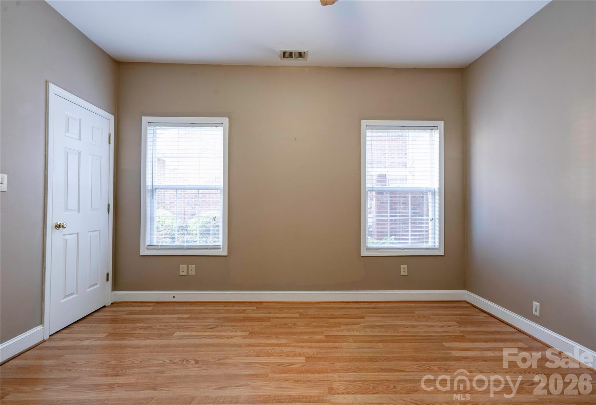 150 Columns Circle Shelby, NC 28150 - Photo 27 of 42 a view of an empty room with wooden floor and a window