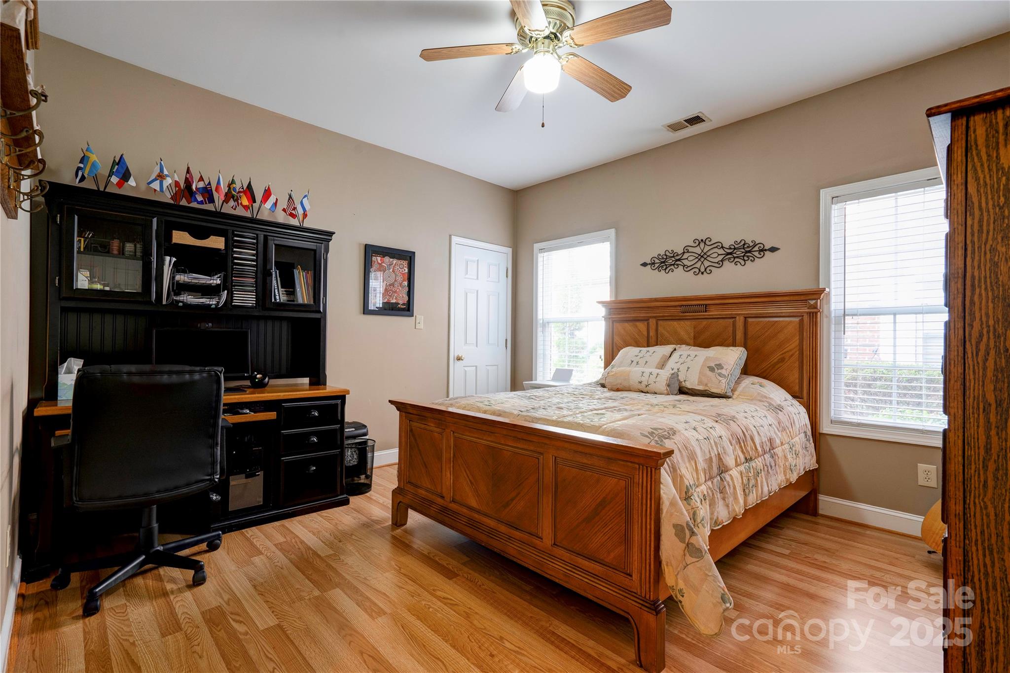 150 Columns Circle Shelby, NC 28150 - Photo 29 of 44 a bedroom with a bed and a chandelier