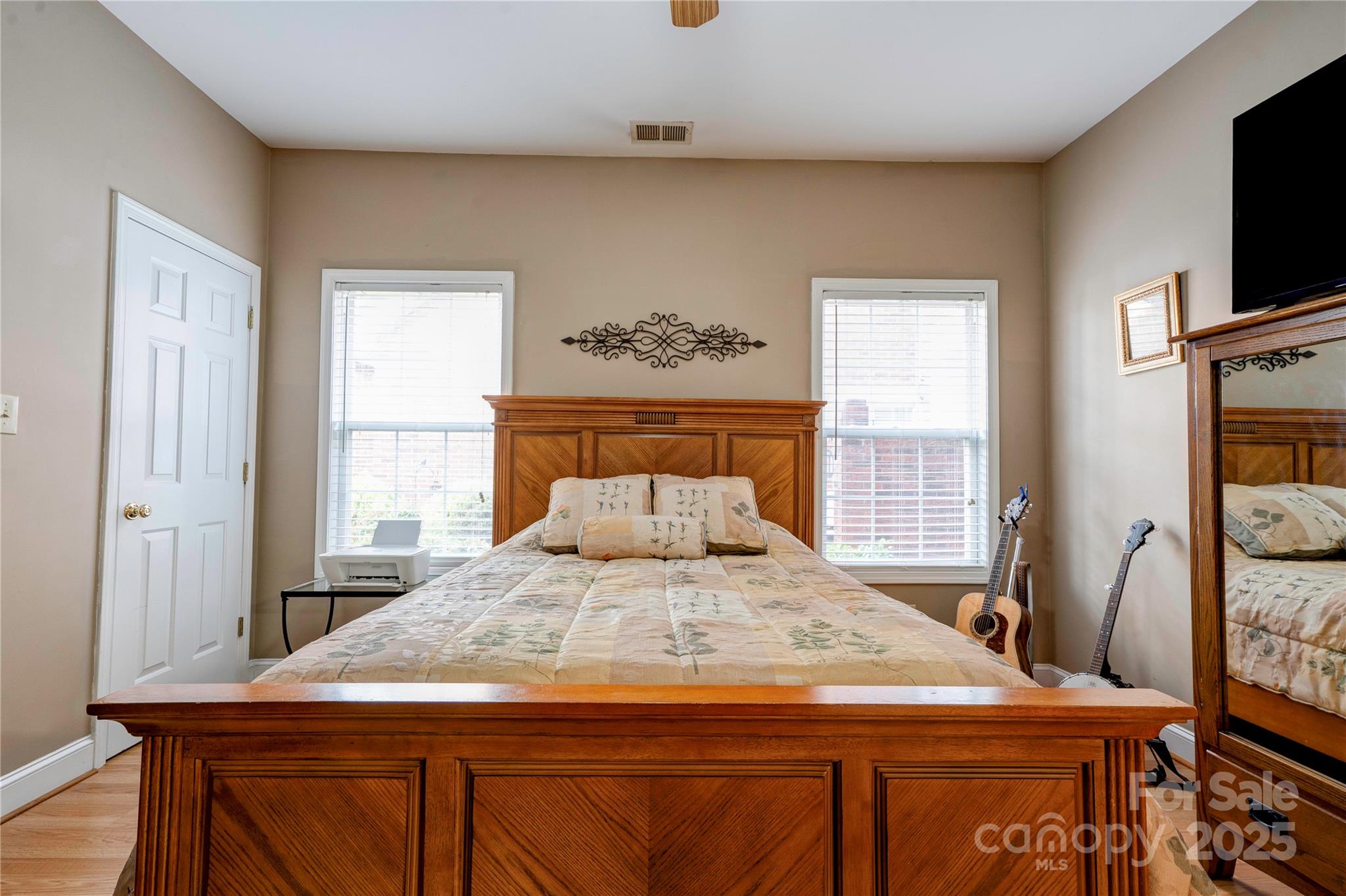 150 Columns Circle Shelby, NC 28150 - Photo 30 of 44 a bedroom with a bed and flat tv screen on the dresser