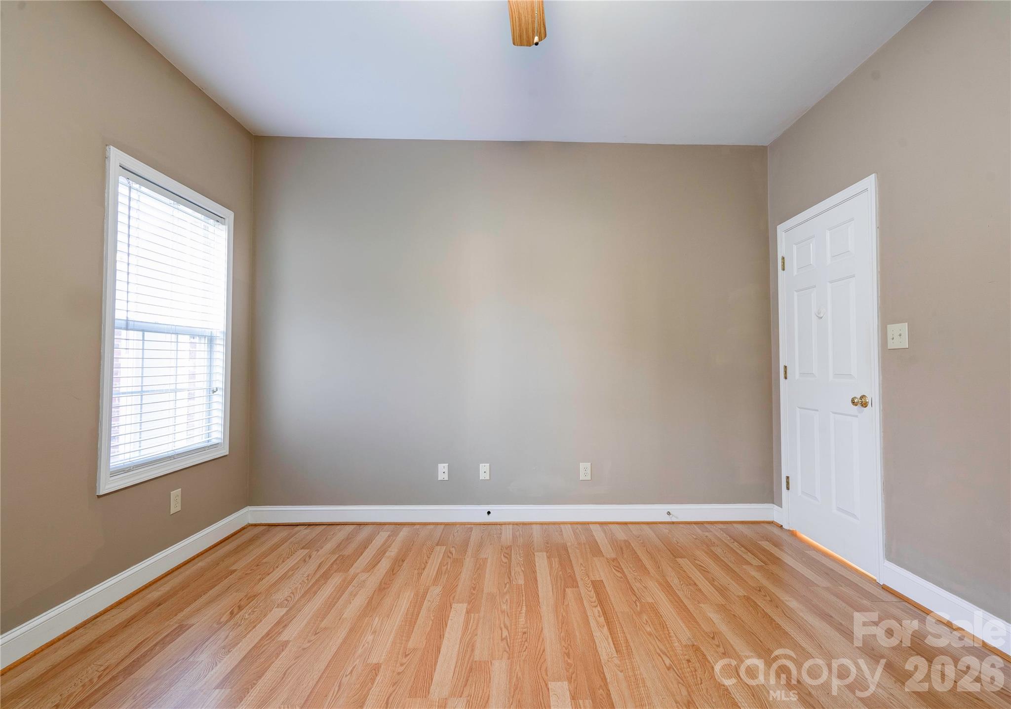 150 Columns Circle Shelby, NC 28150 - Photo 30 of 42 an empty room with wooden floor and windows