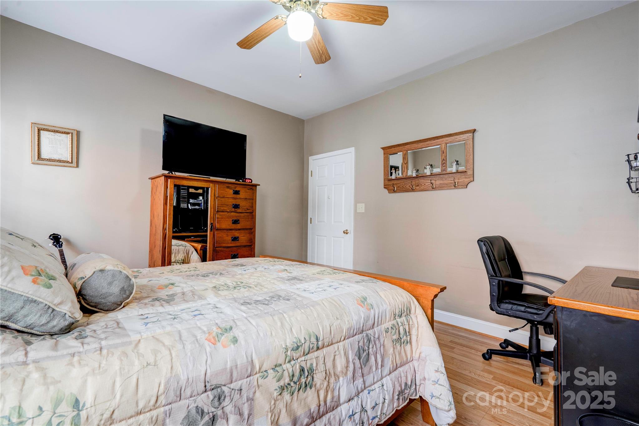 150 Columns Circle Shelby, NC 28150 - Photo 31 of 44 a bedroom with a bed and a flat screen tv