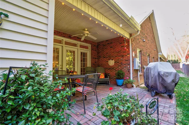 a balcony with furniture and wooden floor