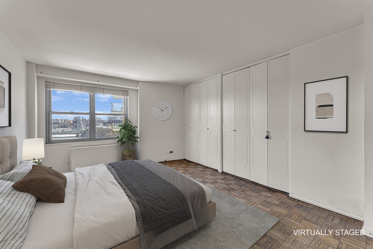 2500 Johnson Avenue, Unit 6T Bronx, NY 10463 - Photo 6 of 8 a bedroom with a bed and a window