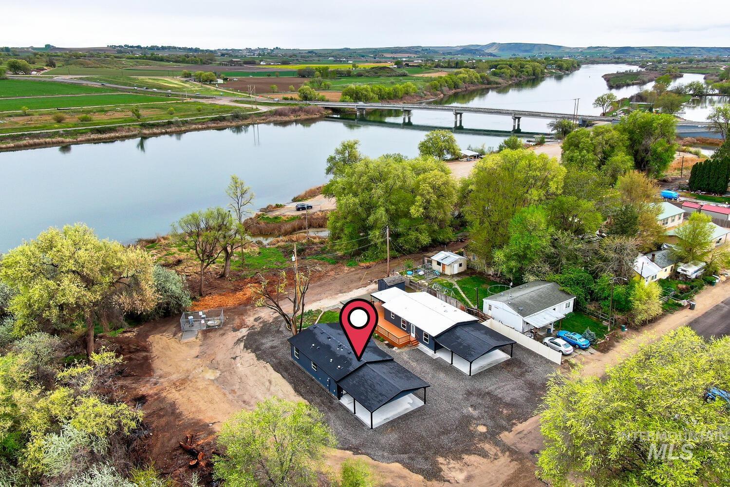 166 1st Street North Marsing, ID 83639 - Photo 2 of 37 Bird's eye view of a large body of water and a notable bridge